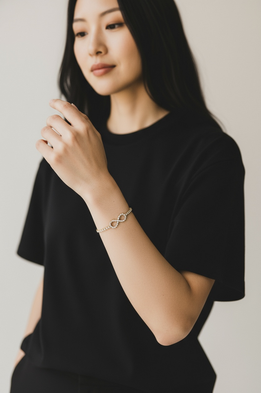 Eternal Sparkle gold tone Infinity Bangle