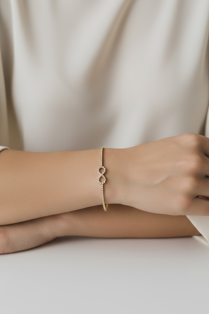 Eternal Sparkle gold tone Infinity Bangle